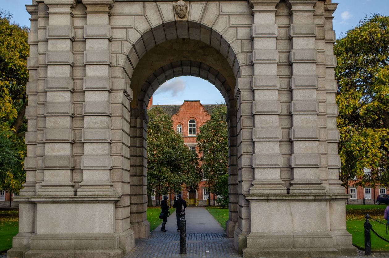 Stone archway leading into the Trinity College Dublin campus